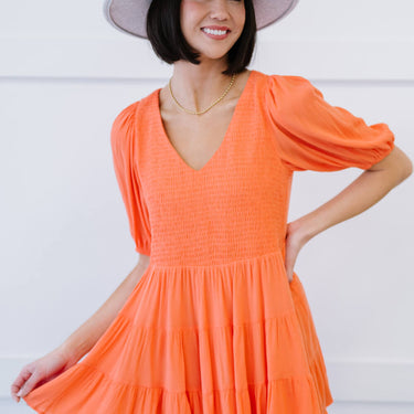 Davi & Dani One-Way Ticket Smocked Tiered Babydoll Blouse - LXM Fashion 
