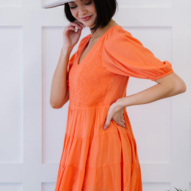Davi & Dani One-Way Ticket Smocked Tiered Babydoll Blouse - LXM Fashion 